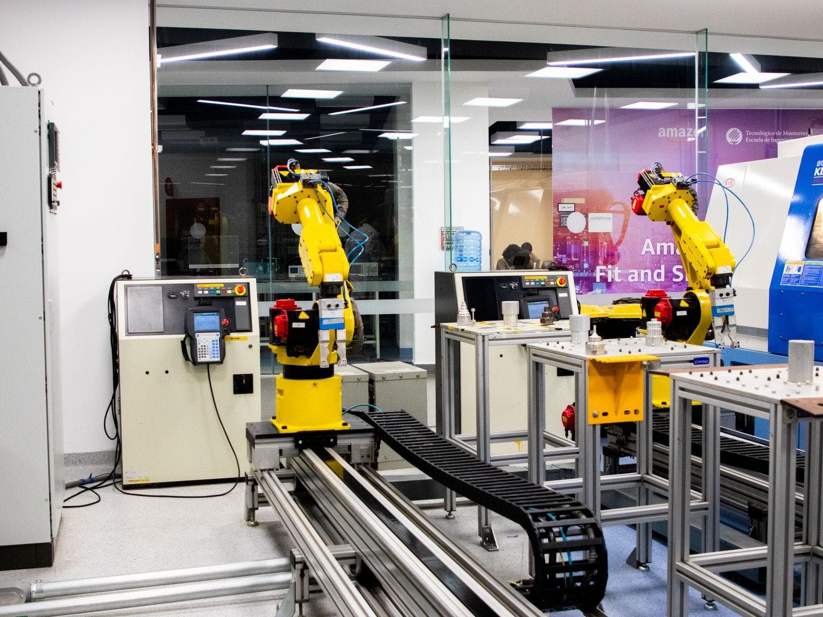Industrial robots operating on a factory automation line